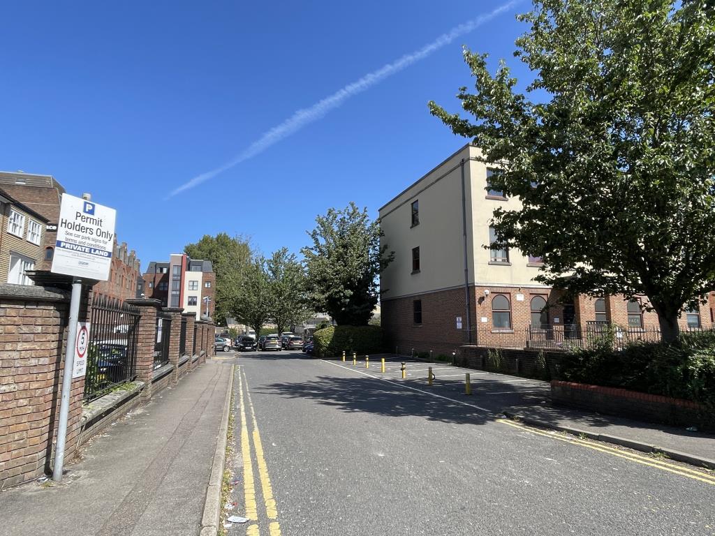 Lot: 169 - EIGHT CAR PARKING SPACES IN TOWN CENTRE - View towards town centre car spaces